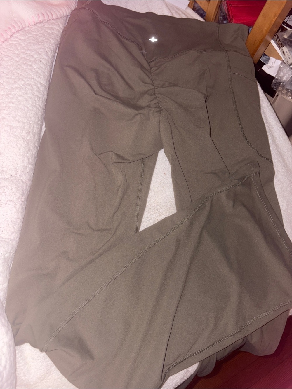 NWTS HALARA Olive Green flared Leggings. With side pockets. Logo on the back.